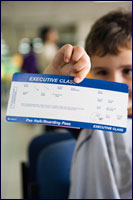 boy holding airline ticket